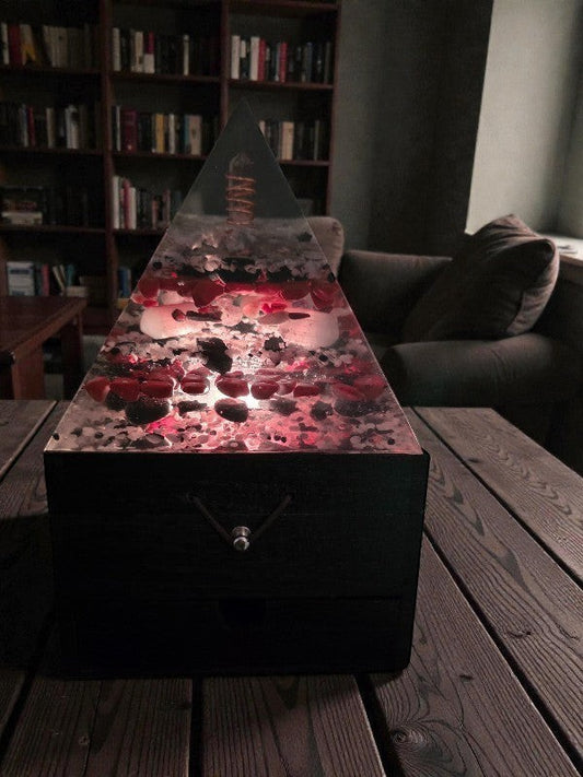 Soul Stone Designs Aegis Root orgonite pyramid lamp with clear quartz, red jasper, black obsidian, and selenite. Grounding and protective.
