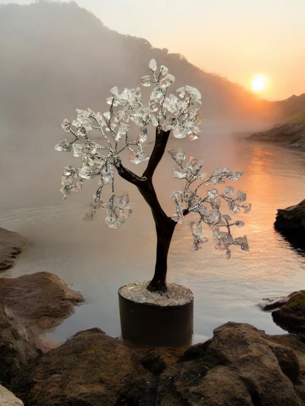 Gemstone crystal tree sculpture displayed in natural warm light
