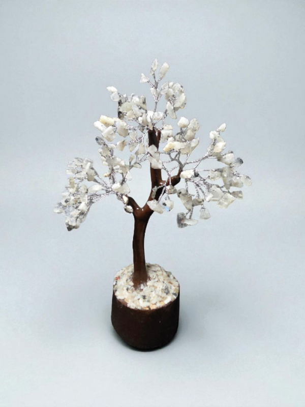 Handcrafted rainbow moonstone crystal tree with white iridescent gemstone leaves on a stone-filled base