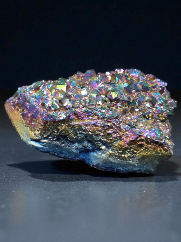 A radiant Titanium Aura Quartz cluster