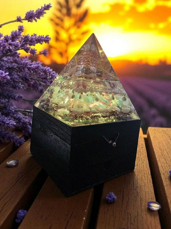 Soul Stone Designs Celestial Clarity orgonite pyramid lamp with crystals, copper, and sacred geometry. Glows with soft light.