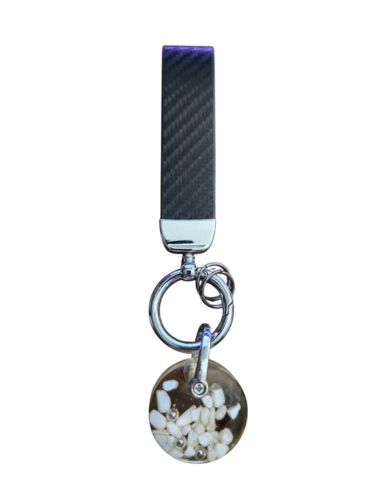 Soul Stone Designs Howlite mini orgonite keychain with white stones and metal shavings in resin. Black carbon fiber strap.