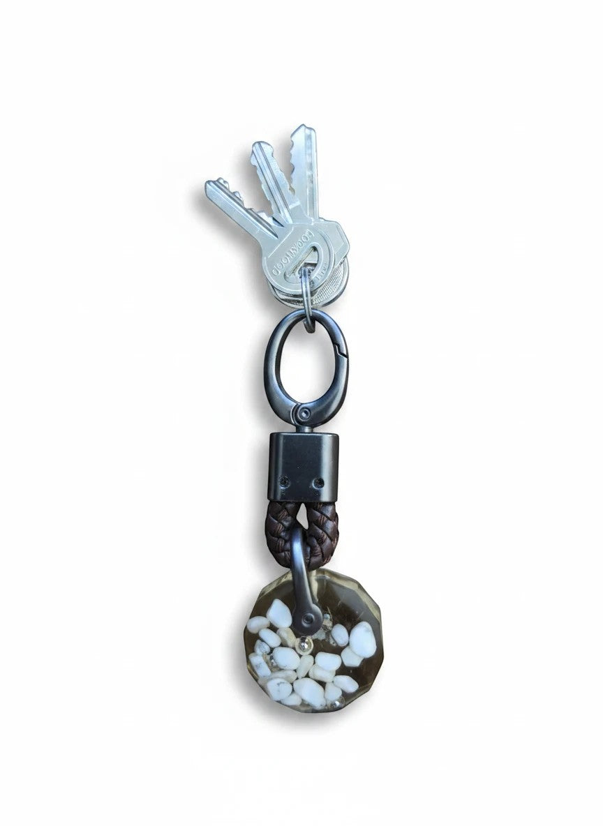 Soul Stone Designs Howlite mini orgonite keychain with keys. Features clear resin with white stones and braided leather detail.