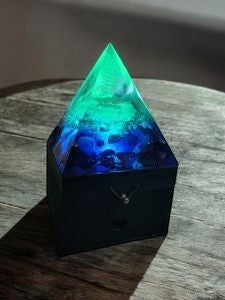 Soul Stone Designs Lunar Tides Orgonite Lamp with blue and green swirling resin, raw clear quartz, and wooden box base.