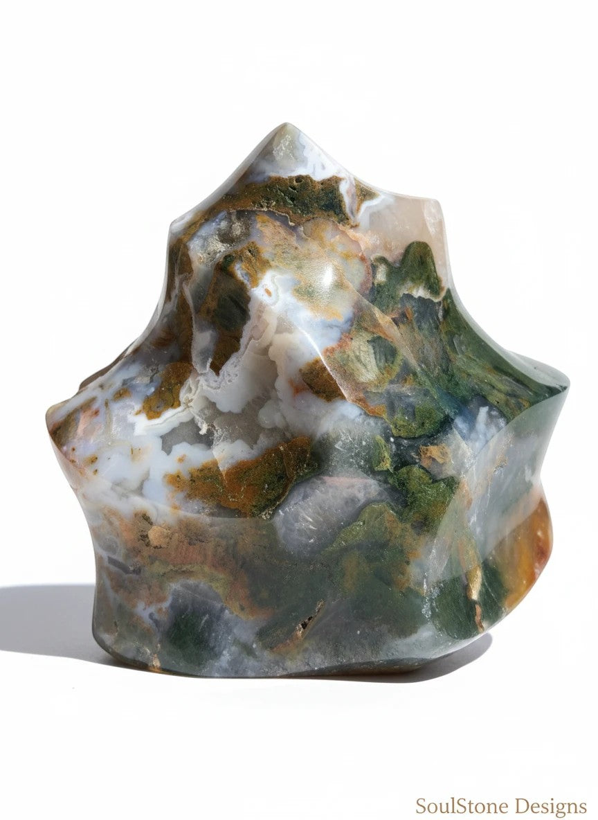SoulStone Designs Ocean Jasper flame with green, white, and brown inclusions. Polished stone sculpture.