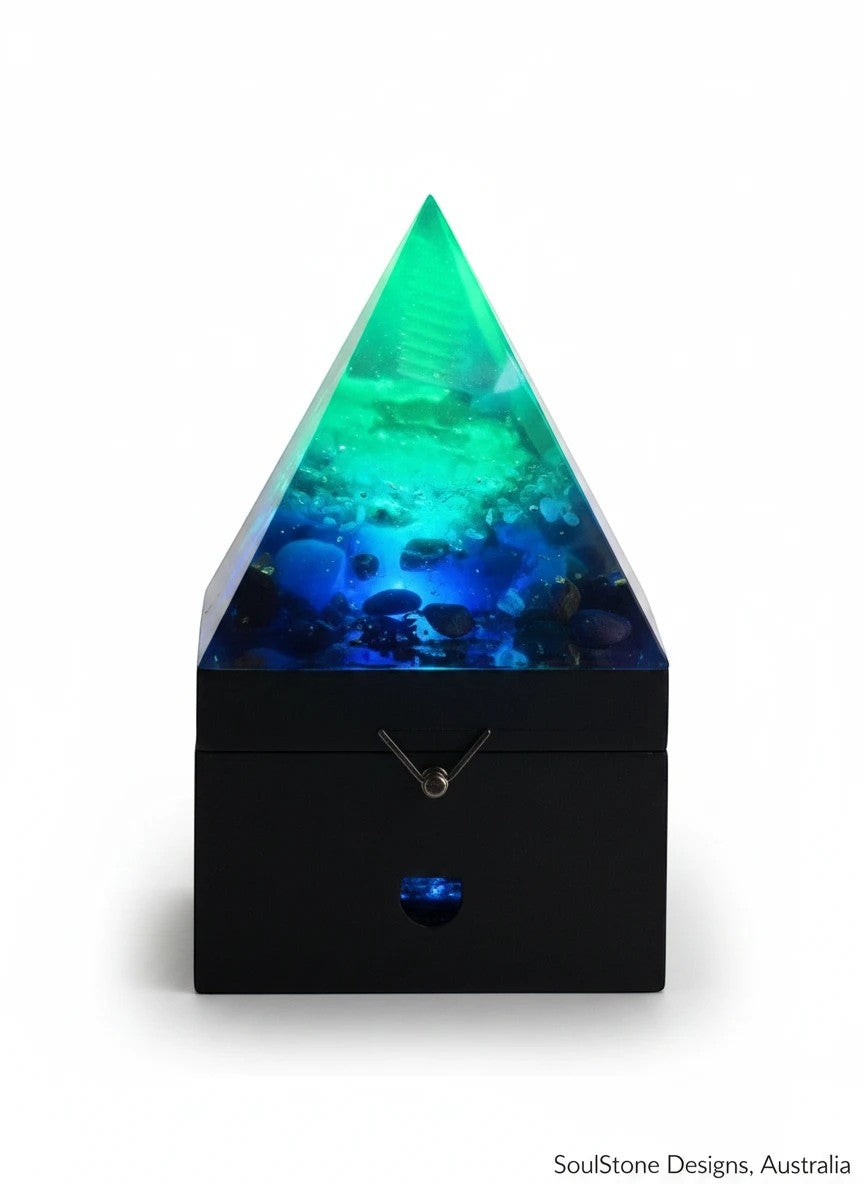 SoulStone Designs pyramid orgonite lamp with blue and green resin, stones, and a wooden box base.