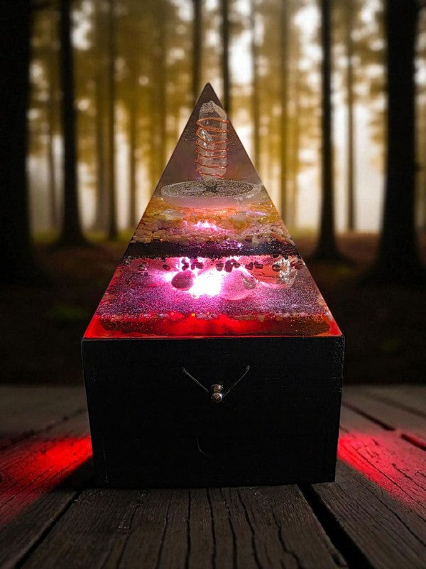 Soul Stone Designs pyramid orgonite lamp with Clear Quartz, Selenite, Citrine, Sunstone, Rose Quartz, and Honey Calcite. Features a Tree of Life design and LED light.
