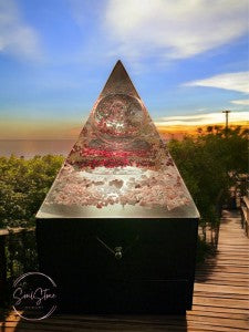 SoulStone Designs orgonite pyramid lamp with Metatron's Cube glass sphere, Flower of Life copper disc, and six crystal points on a wooden base.