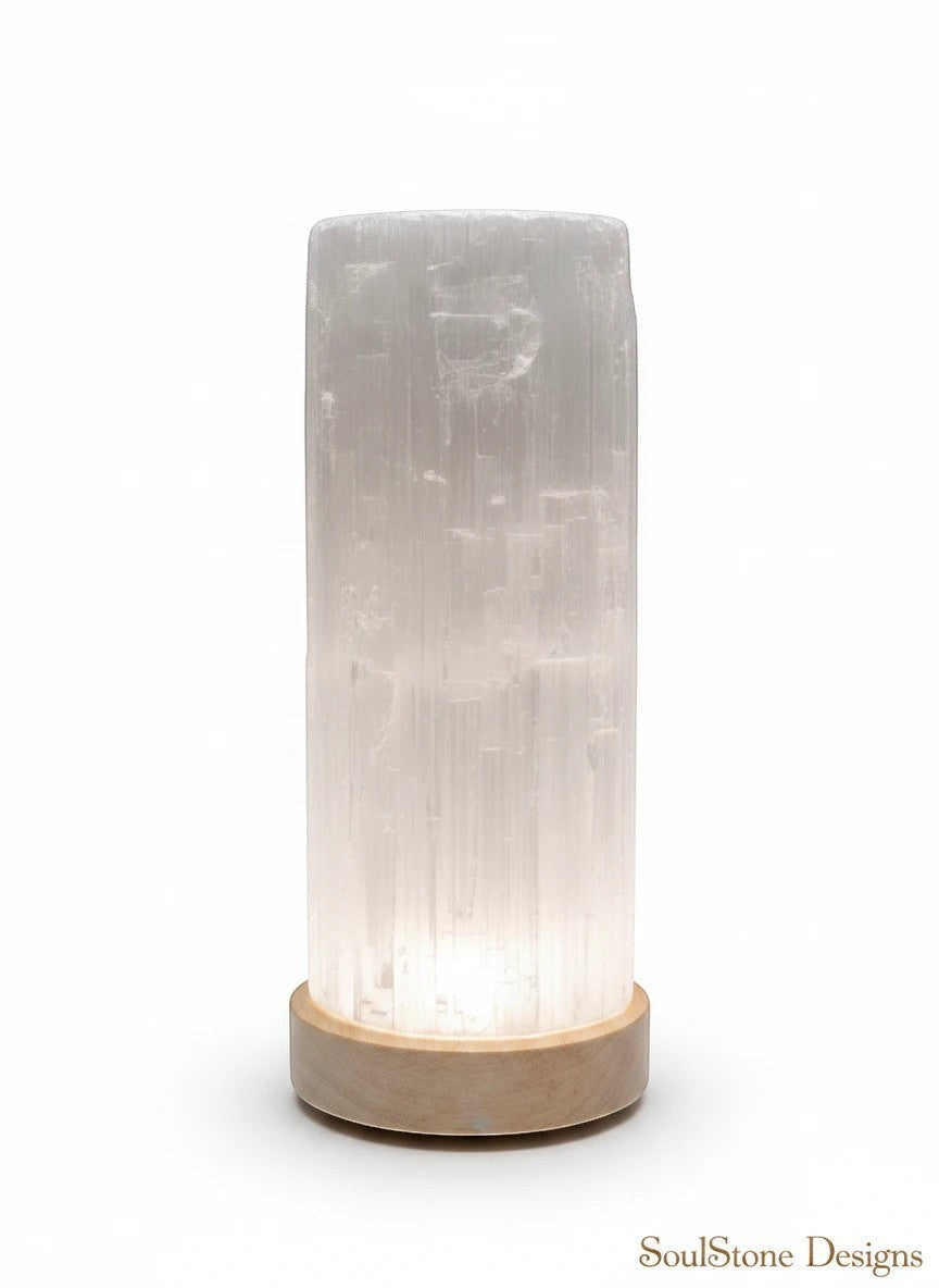 SoulStone Designs natural selenite tower lamp with multicolour LED base, diffuses soft light for calm and clarity.