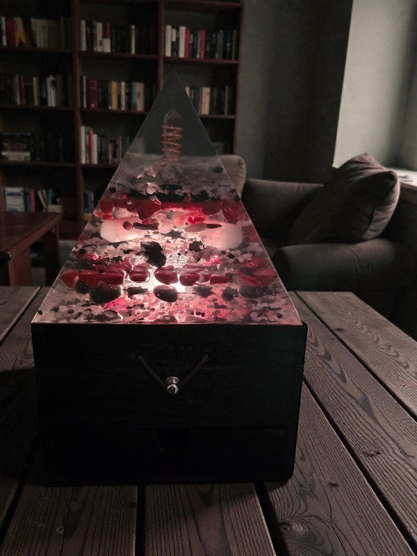 Soul Stone Designs Aegis Root orgonite pyramid lamp with clear quartz, red jasper, black obsidian, and selenite. Grounding and protective.
