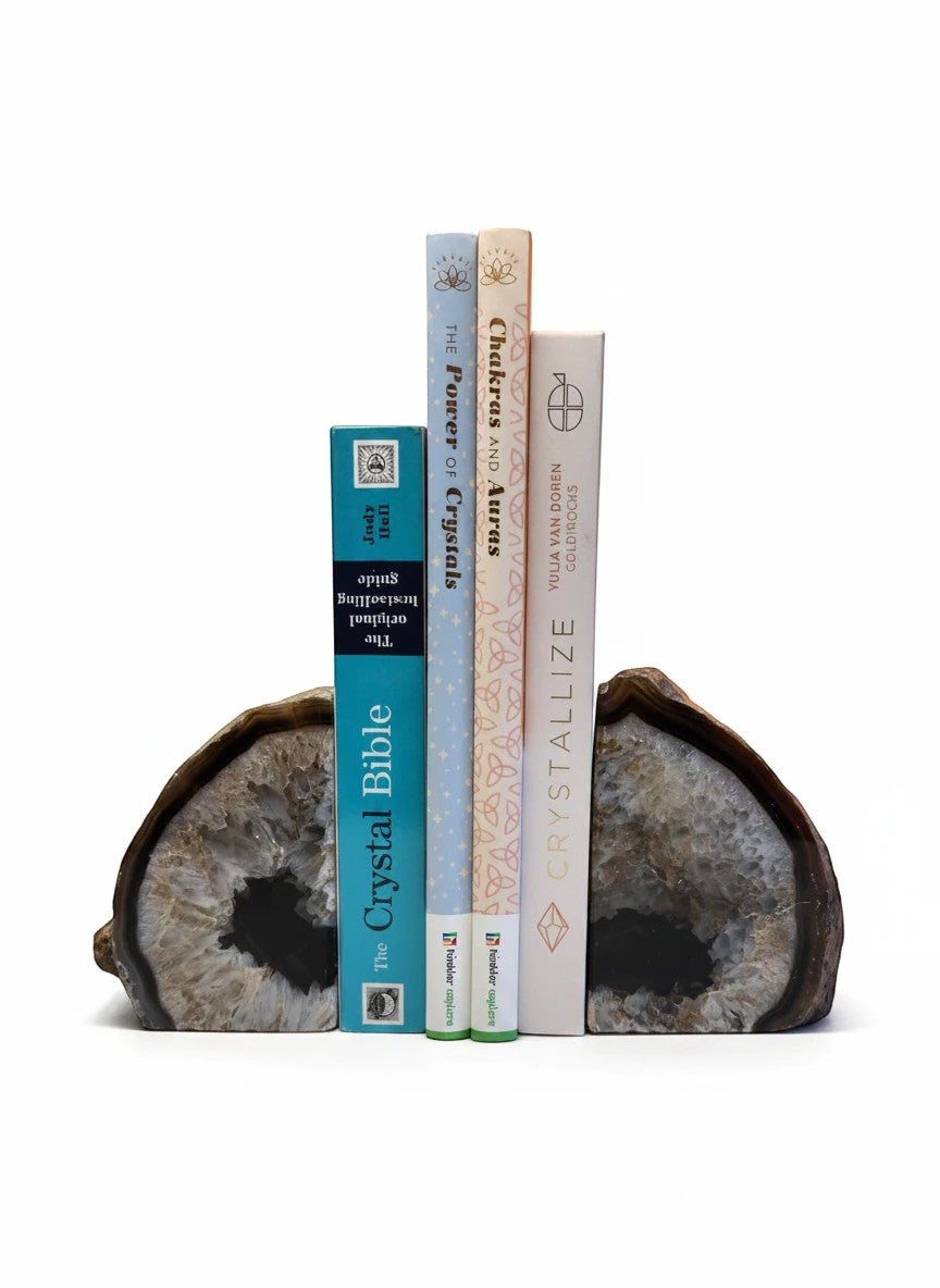Soul Stone Designs natural agate bookends with grey and white crystal formations holding books.