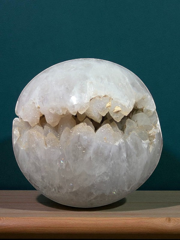 Soul Stone Designs clear quartz sphere with a natural sugar druzy cavity, polished exterior, and sparkling crystal interior.