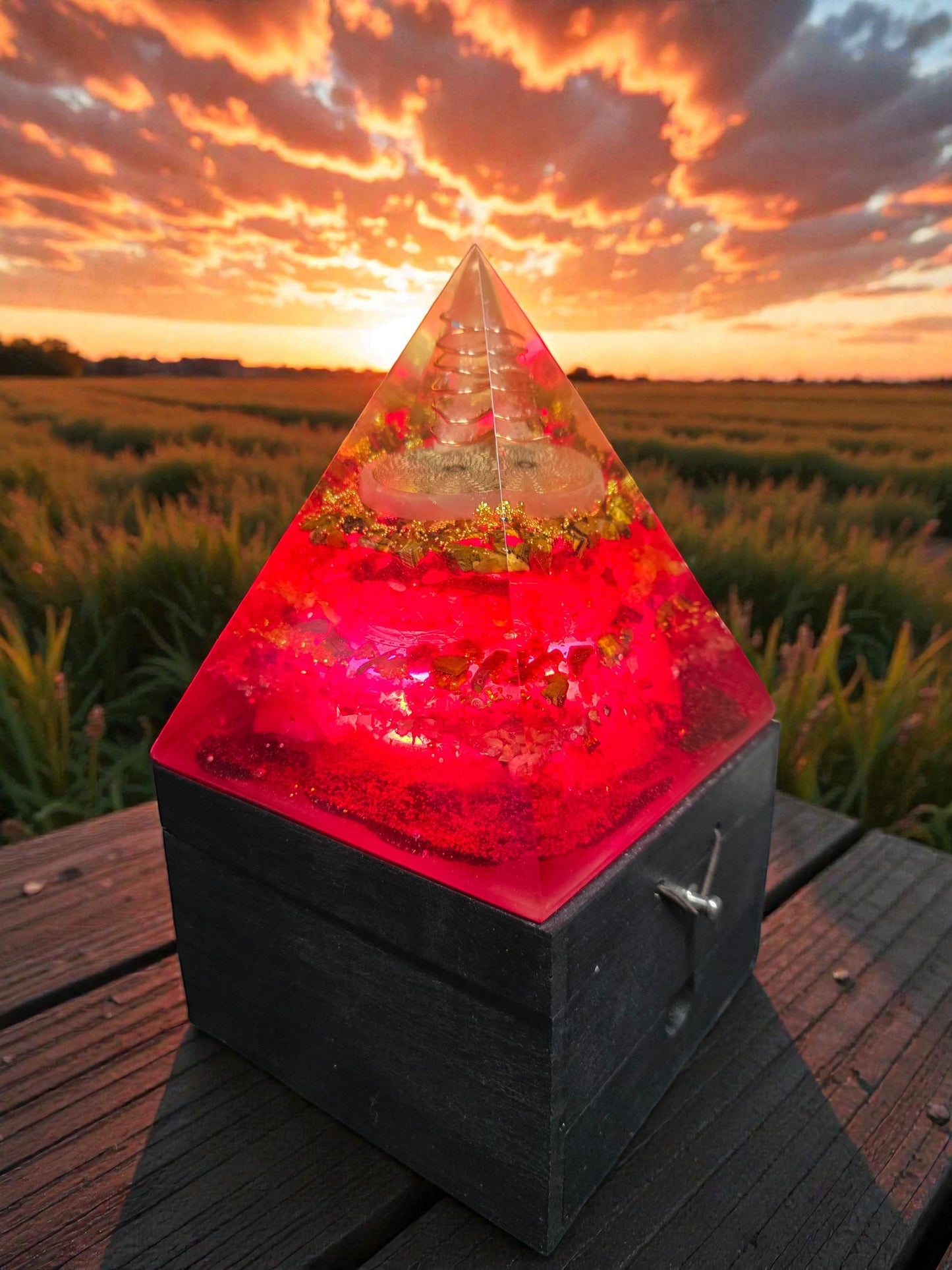 Soul Stone Designs Lotus Radiance Orgonite Lamp with red resin, copper torus, and clear quartz pyramid.