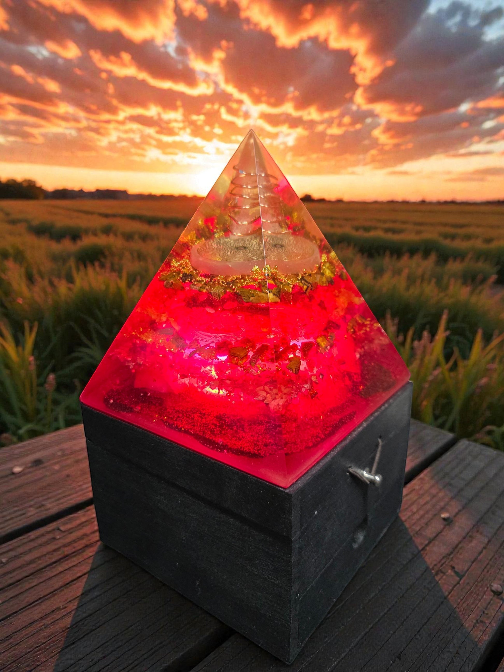 Soul Stone Designs Lotus Radiance Orgonite Lamp with red resin, copper torus, and clear quartz pyramid.