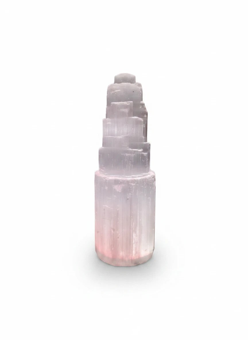 SoulStone Designs tall white selenite tower with pink glow at base, natural striations, includes multicoloured light base.